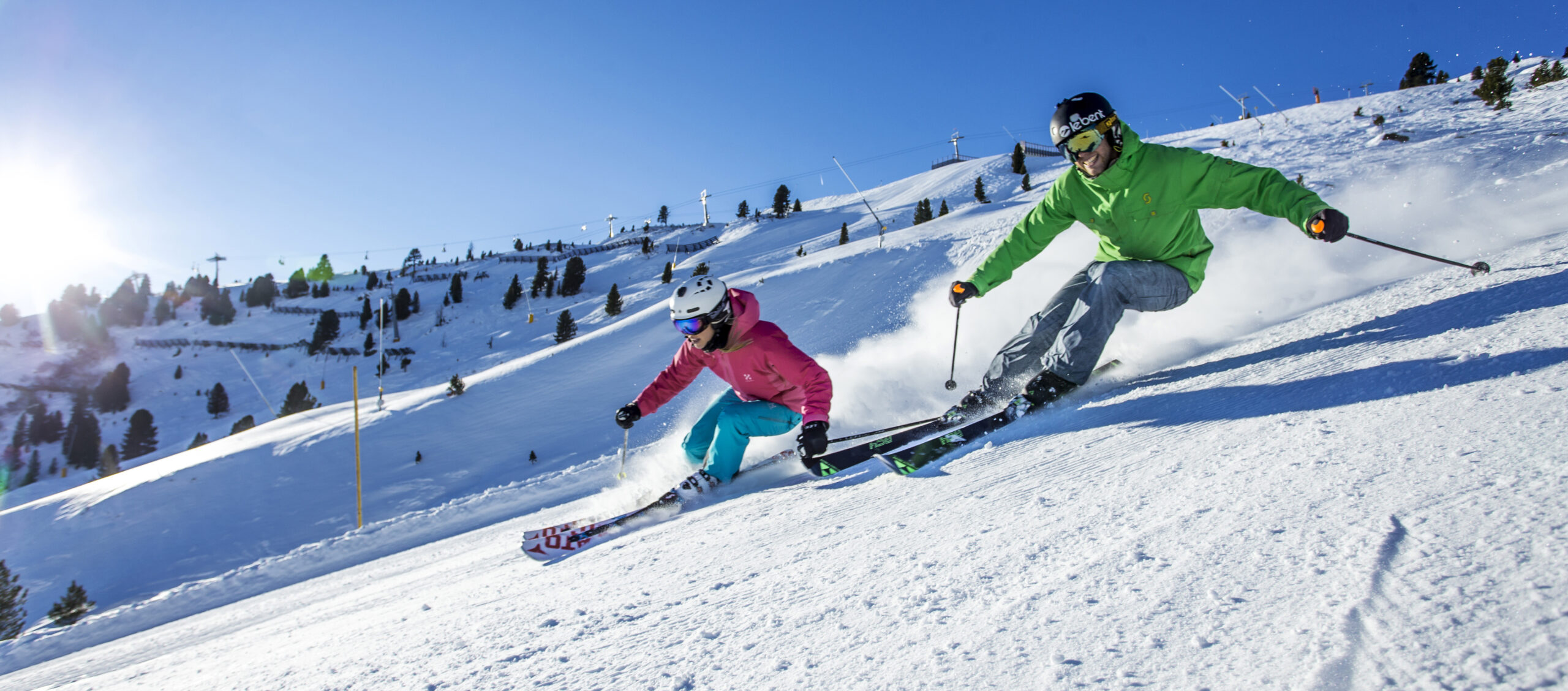 skiers having fun skiing in Europe in the Zillertal Valley